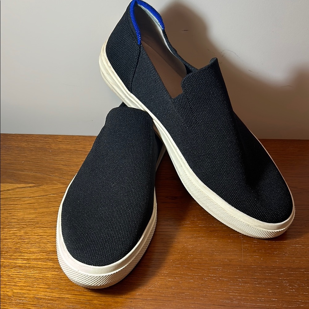 Rothy’s Original Slip On Sneaker in Black with Blue trim Mens size 11.5
